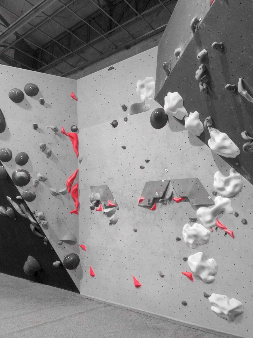 Photographie du bloc coté 6b+ dans le secteur Grand mur la salle Bloc Session Nancy.